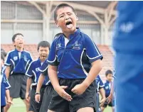  ??  ?? Japanese children perform New Zealand’s haka.