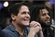  ?? CHRIS PIZZELLO — THE ASSOCIATED PRESS FILE ?? In this Saturday file photo, Dallas Mavericks owner Mark Cuban watches from the crowd during NBA All-Star Saturday in Los Angeles.