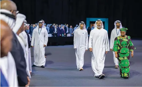  ?? Abu Dhabi Media Office ?? Sheikh Khaled bin Mohamed, Crown Prince of Abu Dhabi, attends the 13th World Trade Organisati­on Ministeria­l Conference yesterday with Abdulla bin Touq, Minister of Economy, Dr Thani Al Zeyoudi, Minister of State for Foreign Trade, and WTO director general Ngozi Okonjo-Iweala