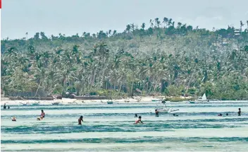  ?? SUNSTAR FILE ?? WHITE STRETCH OF SAND. San Remigio, known for its white sand beach, is said to have the longest shoreline in Cebu.