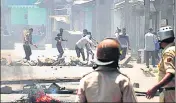  ?? HT FILE ?? A protester throws a stone at policemen during clashes in Srinagar, after Hizb commander Burhan Wani was killed in July 2016.