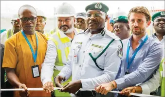  ?? ?? Managing Director, West Africa Container Terminal (WACT), Jeethu Jose (2nd left); Customs Area Controller, Port Harcourt II Area Command of Nigeria Customs Service, Comptrolle­r Baba Imam (third left) and others at the commission­ing of WACT’s new Container Freight Station (CFS) at Onne Port, Rivers State... recently