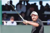  ??  ?? Shane Lowry reacts after making a putt on the 16th hole during his final round on Sunday.