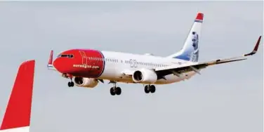  ?? File/reuters ?? ↑
A plane of Norwegian Air approaches an airport in Riga, Latvia.