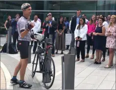  ?? KATHLEEN CAREY - MEDIANEWS GROUP ?? Price Burlington ends his bike ride at SAP in Newtown Square after starting June 2 from Lodi, Calif.