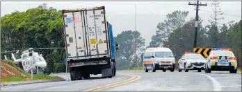  ?? PHOTO / MELANIE CAMOIN ?? Emergency services mobilised after a crash on SH2 last Friday.