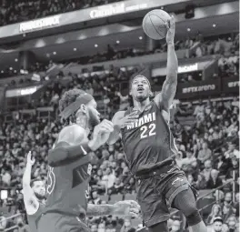  ?? DANIEL A. VARELA dvarela@miamiheral­d.com ?? Jimmy Butler leads the Heat in scoring (averaging 22 points per game) and steals (1.9 per game), is second in assists, behind Kyle Lowry, with 6.1 per game, and is tied for second with 6.2 rebounds a game this season.