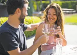  ??  ?? Hisham (left) and and Hind Zawil sip wine at Folktale Winery, one of the array of activities in tourist-friendly Carmel.