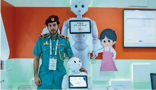  ??  ?? the uaQ Police introduce robotalk, a special robot that can help them interact with kids.