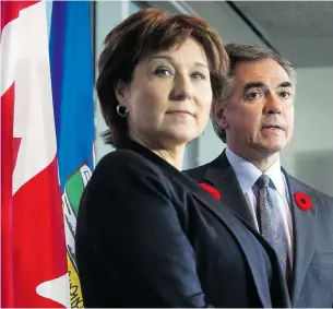  ?? DARRYL DYCK/THE CANADIAN PRESS FILES ?? A recent poll suggests Albertans would accept a deal between Premier Christy Clark and Alberta Premier Jim Prentice, right, that would see B.C. get some of the oil revenues generated by the Northern Gateway pipeline.