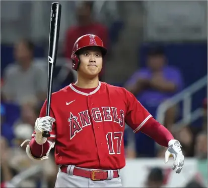  ?? LYNNE SLADKY – THE ASSOCIATED PRESS ?? The Angels and Shohei Ohtani were held to just three hits by the Miami Marlins on Tuesday night in their fourth consecutiv­e loss.