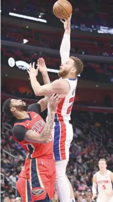  ??  ?? Detroit Pistons’ Blake Griffin (23) shoots against New Orleans Pelicans’ Anthony Davis (23) during the fourth quarter at Little Caesars Arena. — USA Today Sports