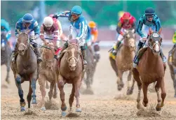  ?? Tribune News Service ?? Mage, with Javier Castellano up, wins the 149th running of the Kentucky Derby at Churchill Downs in Louisville, Kentucky, on Saturday.