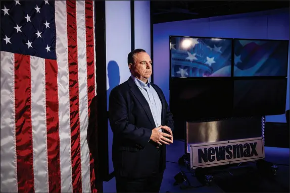  ?? SCOTT MCINTYRE / THE NEW YORK TIMES FILE (2020) ?? Christophe­r Ruddy, CEO of Newsmax, is pictured Nov. 19, 2020, on the set of a Newsmax television studio in Boca Raton, Fla. Newsmax’s anchors have been pounding away at satellite TV provider Directv, which dropped Newsmax on Jan. 25 after the two sides failed to come to terms on a new carriage agreement.