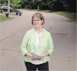  ?? PETER LEE WATERLOO REGION RECORD ?? Carolyn Keating is one of many residents of Bedford Road in Kitchener who opposed a City of Kitchener proposal to add cycling lanes to the street.