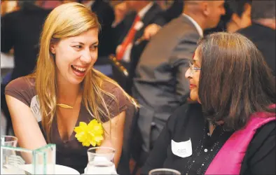  ?? Autumn Driscoll ?? Marcella Kovac talks with Angela DeMello during the Bridgeport Regional Business Council’s Annual Meeting and Luncheon in 2014.