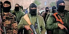  ?? | Reuters ?? Military personnel take part in a parade calling for parliament­ary and presidenti­al elections in Tripoli, Libya, earlier this year.