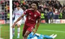 ?? Joensson/AFP/Getty Images ?? Kingsley Coman celebrates his late equaliser for Bayern Munich in their Champions League last-16 first leg. Photograph: Kerstin
