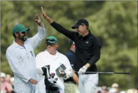  ?? DAVID J. PHILLIP - AP ?? Jordan Spieth celebrates making the green on the 12th hole during the fourth round at the Masters golf tournament Sunday, in Augusta, Ga.