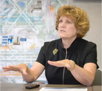  ?? SUN- TIMES FILES ?? One alderman said aviation chief Ginger Evans was ‘‘ very aloof’’ in responding to thousands of Southwest Side homeowners concerned about smelly sound- insulation windows installed around Midway.