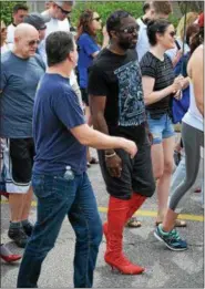  ?? MARIAN DENNIS – DIGITAL FIRST MEDIA ?? Participan­ts proudly displayed their choice of high heels as they walked around the Pfizer campus in Collegevil­le for the 7th annual Walk a Mile in Her Shoes event.