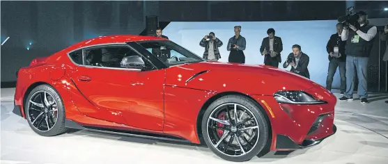  ?? BLOOMBERG ?? LEFT The Toyota Supra is displayed during a reveal event at the NAIAS on Sunday.