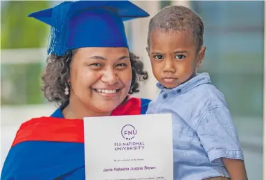  ?? Photo: Leon Lord ?? Janis Brown with son Alex Brown after her graduation on Friday.