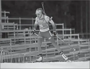  ?? Associated Press ?? No spectators: Slovakia's Ivona Fialkova competes during the women's Biathlon World Cup Thursday in Nove Mesto na Morave, Czech Republic. Due to the coronaviru­s the Biathlon World Cup takes place without spectators.