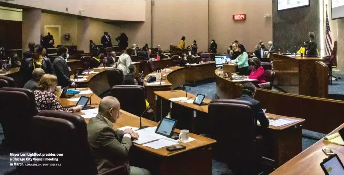  ?? ASHLEE REZIN/SUN-TIMES FILE ?? Mayor Lori Lightfoot presides over a Chicago City Council meeting in March.