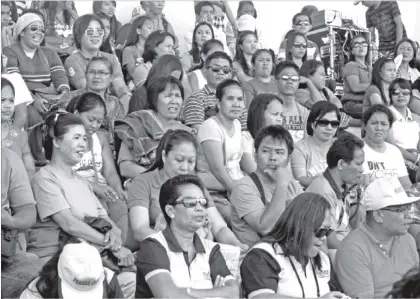  ??  ?? IT IS MID-DAY and spectators still remain in their seats waiting for the closing program of the Davao Region Athletic