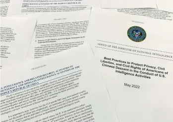  ?? JON ELSWICK/AP ?? A new report from the Office of the Director of National Intelligen­ce addresses surveillan­ce of Chinese Americans.