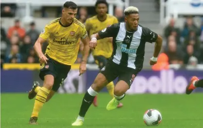  ?? Photograph: Greig Cowie/BPI/Shuttersto­ck ?? Granit Xhaka pursues Joelinton during Arsenal’s 1-0 win against Newcastle in August.