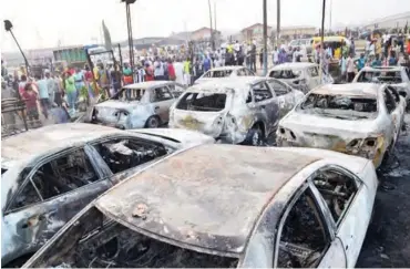  ??  ?? One of the car dealers collapsed after discoverin­g that he lost 16 cars to the inferno