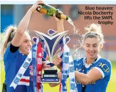  ?? ?? Blue heaven: Nicola Docherty lifts the SWPL trophy