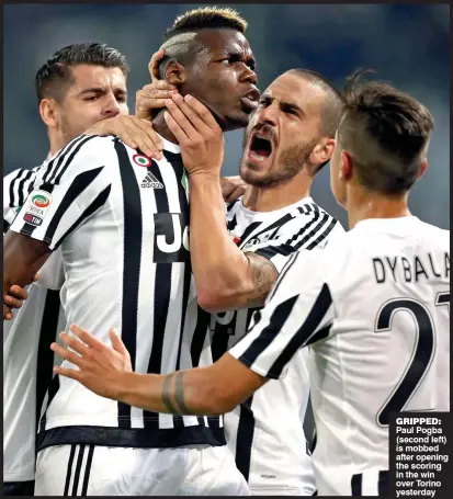  ??  ?? GRIPPED: Paul Pogba (second left) is mobbed after opening the scoring in the win over Torino yesterday