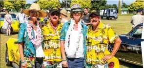  ??  ?? How’s this for twinning? Maurice Addy, Mandy Sinclair, David Addy, and Lisa Sinclair all looked the part. Maurice and David run a pair of almost-matching 1970 and 1974 Corvettes, while the Sinclair girls were cruising in Mandy’s 1948 Plymouth Special Deluxe