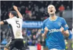  ?? Picture: SNS. ?? Jamie Murphy celebrates his goal.