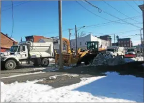  ?? NICHOLAS BUONANNO — NBUONANNO@ TROYRECORD. COM ?? City officials in Cohoes are still sending out their plows to remove snow banks just one week after Winter Storm Stella hit the Capital Region. The storm hit the area last Tuesday morning.