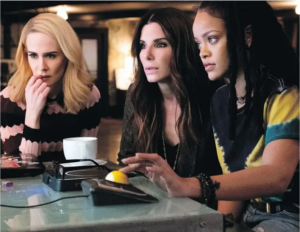  ?? — WARNER BROS. ?? Sarah Paulson, left, Sandra Bullock and Rihanna are three of the female heisters in Ocean’s 8.