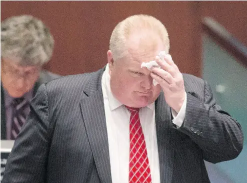  ?? CHRIS YOUNG / THE CANADIAN PRESS FILES ?? Former Toronto mayor Rob Ford wipes his brow in the council chamber at city hall. Virtually all of Ford’s tenure was
marked by descriptio­ns of his glistening face, damp shirt and sweaty palms, columnist Robyn Urback notes.