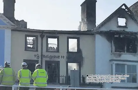  ??  ?? ● A body has now been found after the fire at the Ty Belgrave House hotel in Aberystwyt­h in July