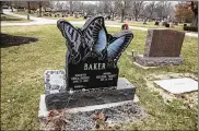  ??  ?? Family dedicated a monument to Erica Baker, the Kettering 9-year-old who disappeare­d in 1999 while walking her dog.