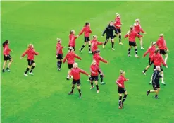  ??  ?? BREDA: Denmark’s national team players stretch during a training session on the eve of the UEFA Women’s Euro 2017 football match between Denmark and Austria, yesterday in Breda. — AFP