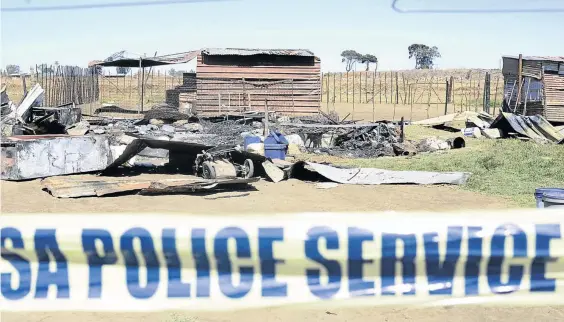  ?? /TIRO RAMATLHATS­E ?? The scene where seven relatives including a baby lost their lives in a shack fire at Senthumile informal settlement.