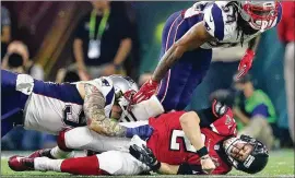  ?? CURTIS COMPTON/ AJC 2017 ?? Matt Ryan is sacked by the Patriots’ Dont’a Hightower (54), forcing a fumble during the fourth quarter, as the Falcons lost their 28-3 lead in the Super Bowl.