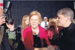  ?? DANIEL ACKER/ BLOOMBERG ?? Sen. Elizabeth Warren, D-Mass., greets attendees during an organizing event in Des Moines, Iowa, on Saturday.