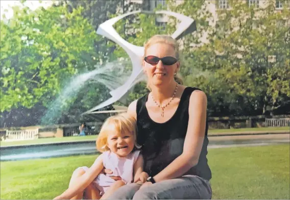  ??  ?? Joanna Moorhead pictured with one of her four children before her diagnosis, after which she faced the prospect of undergoing a mastectomy: ‘I felt I would never be whole again.’ Photo courtesy of Joanna Moorhead