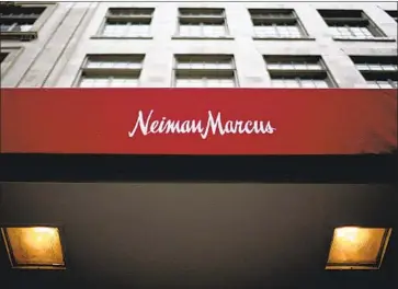  ?? Tom Pennington Associated Press ?? DEPARTMENT STORE chain Neiman Marcus, already struggling because of online rivals, filed for Chapter 11 protection last year. Many economists had expected a sharp rise in bankruptci­es because of shutdowns.