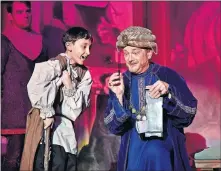  ?? [MUTZ PHOTOGRAPH­Y] ?? Austin Rindler plays Amahl and Mark Johnson plays Kaspar in Painted Sky Opera's 2018 production of the Christmas classic “Amahl and the Night Visitors.” The Oklahoma City opera company will bring back the family-friendly show for its 2019-2020 season.