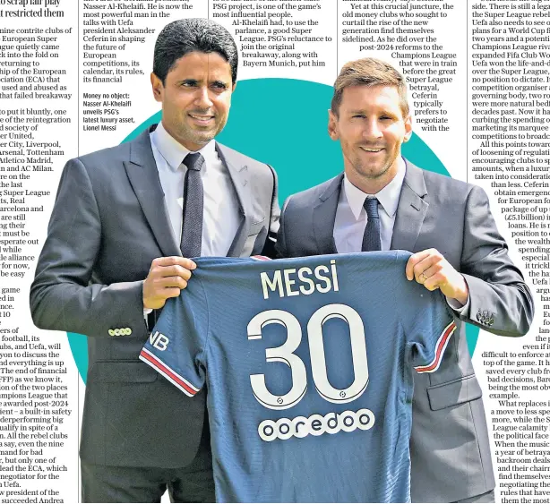 ??  ?? Money no object: Nasser Al-khelaifi unveils PSG’S latest luxury asset, Lionel Messi